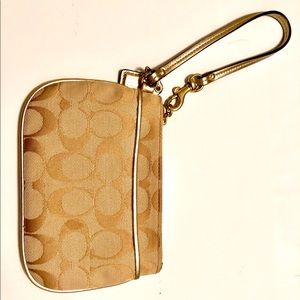 Tan coach wristlet